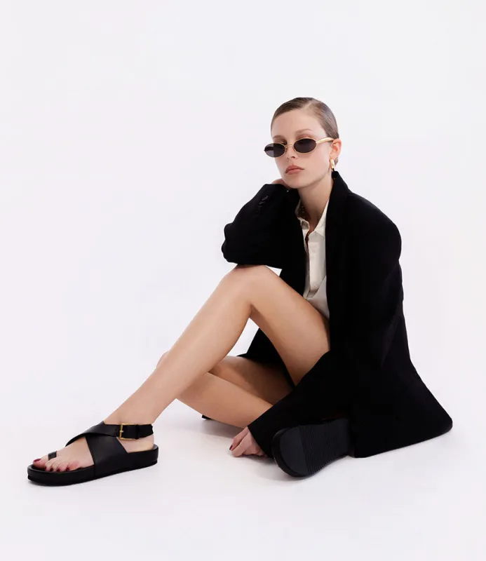 TAMRYN Crossover Sandal with Toe Thong in Black sold by Edward Meller