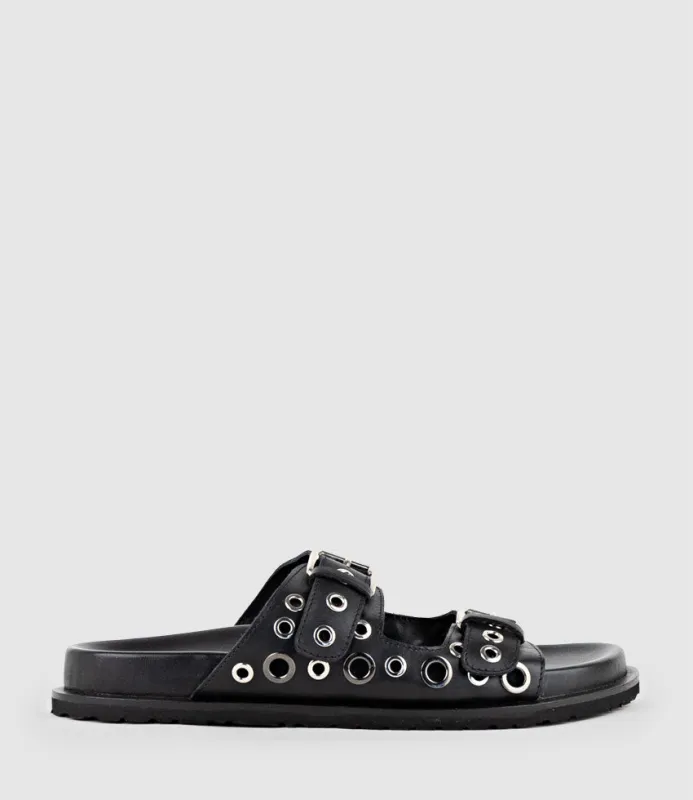 KRYNNE Slide with Eyelets in Black sold by Edward Meller