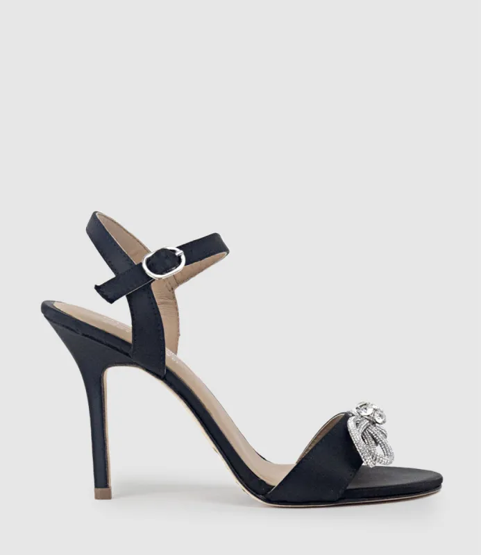 SERENE100 Sandal with Crystal Bow in Black Satin sold by Edward Meller