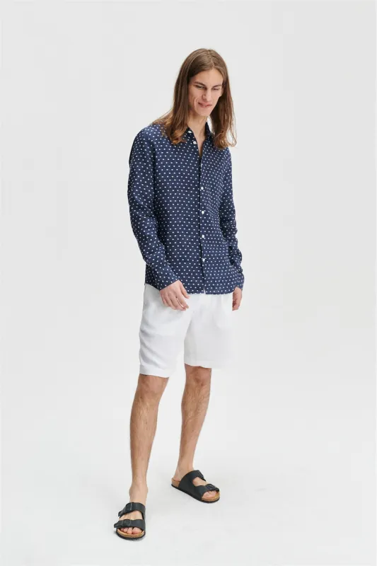 Feel Good Shirt in a Navy Dotted Delavé Italian Linen sold by Delikatessen