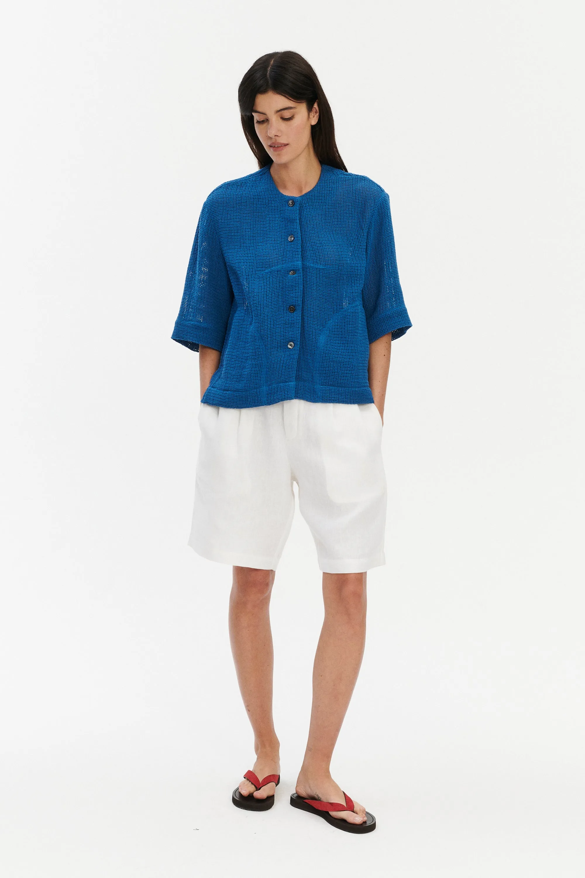 Relaxed Shirt Jacket in a Blue Crochet like fabric sold by Delikatessen