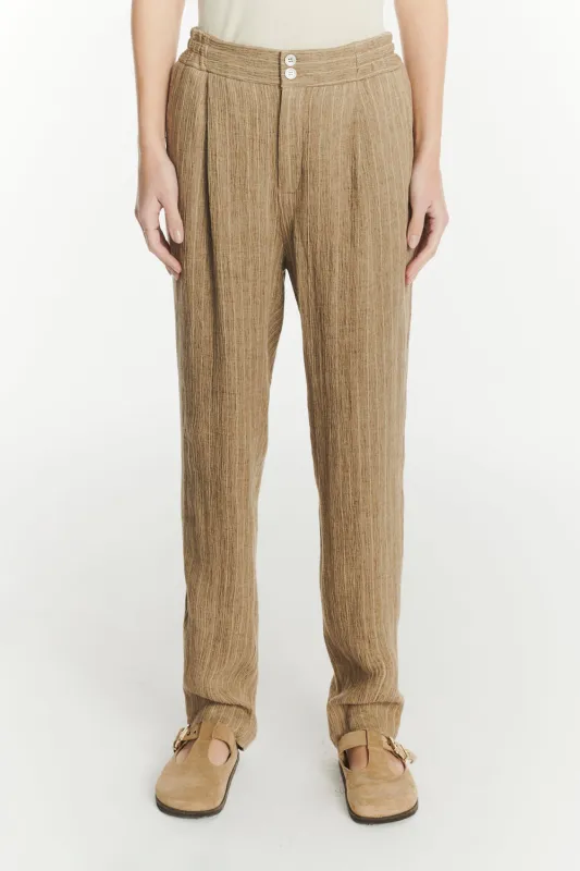 Elasticated Band Trousers in a Camel Fluid Italian Linen and Viscose sold by Delikatessen