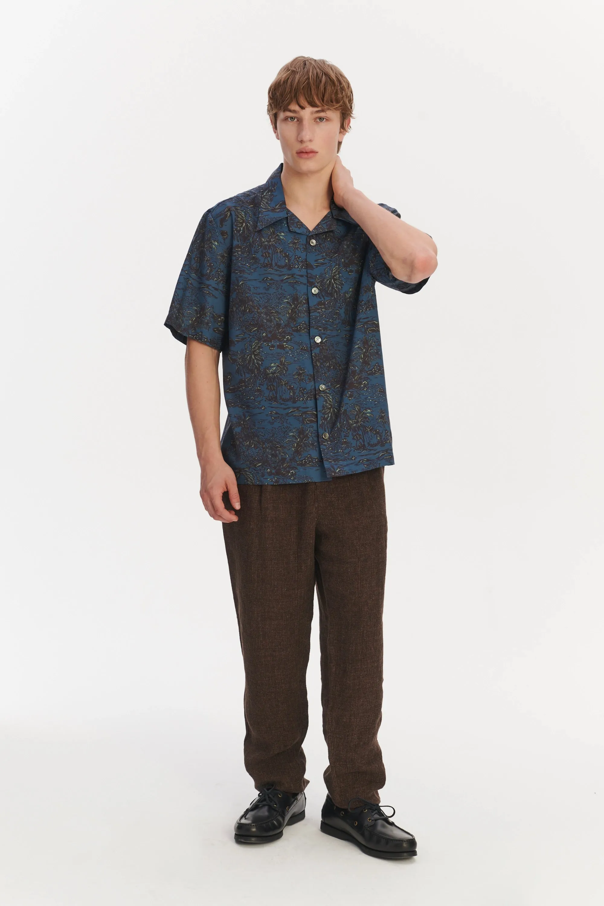 Short Sleeve Cuban Collar Shirt in a Blue Printed Palm Design Italian Cotton and Lyocell sold by Delikatessen