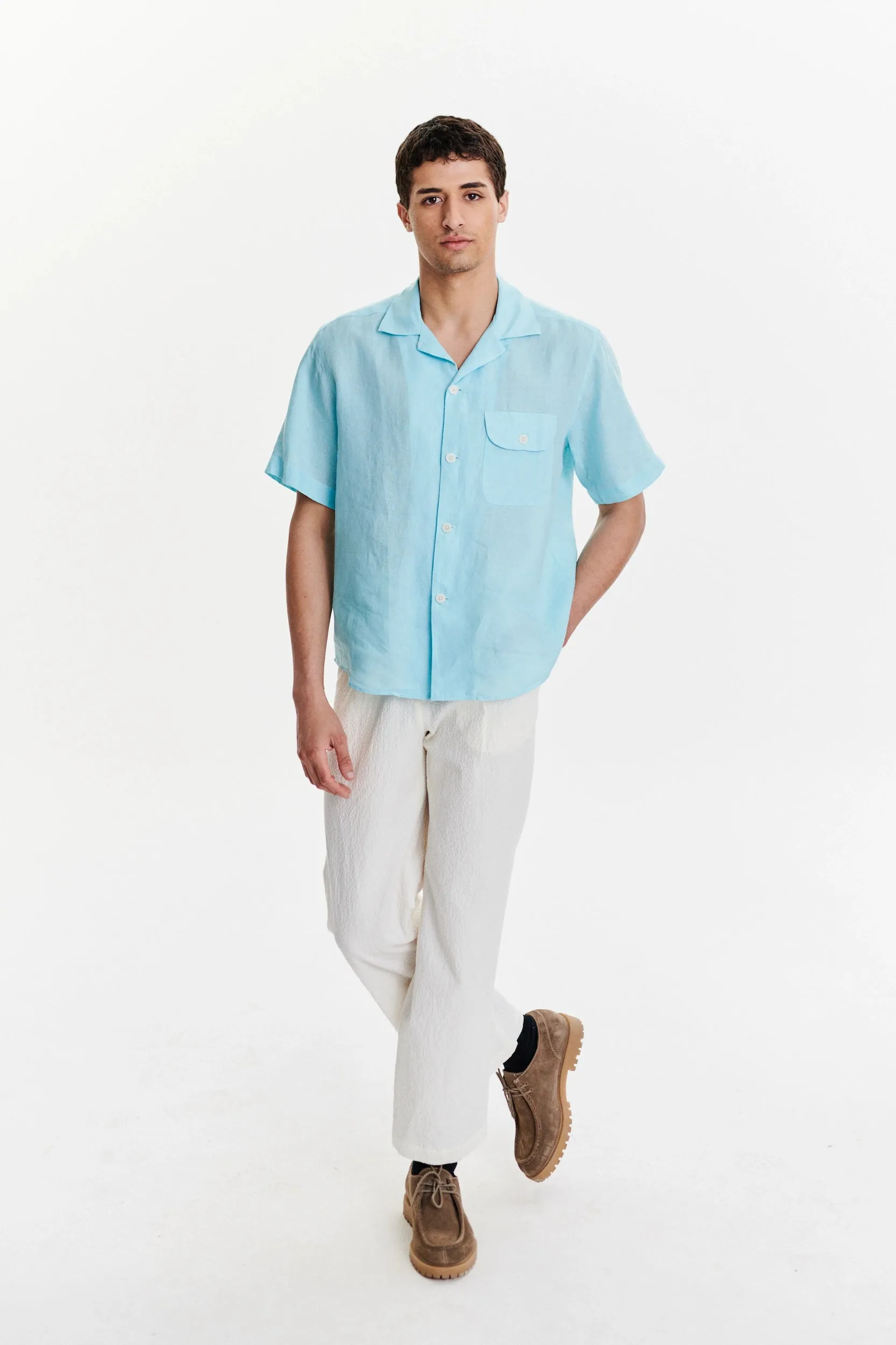 Short Sleeve Camp Collar Shirt in a Blue Turquoise Soft Italian Cotton Seersucker sold by Delikatessen
