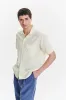 Short Sleeve Camp Collar Shirt in  a  Lemon Cream Soft Italian Cotton Seersucker sold by Delikatessen