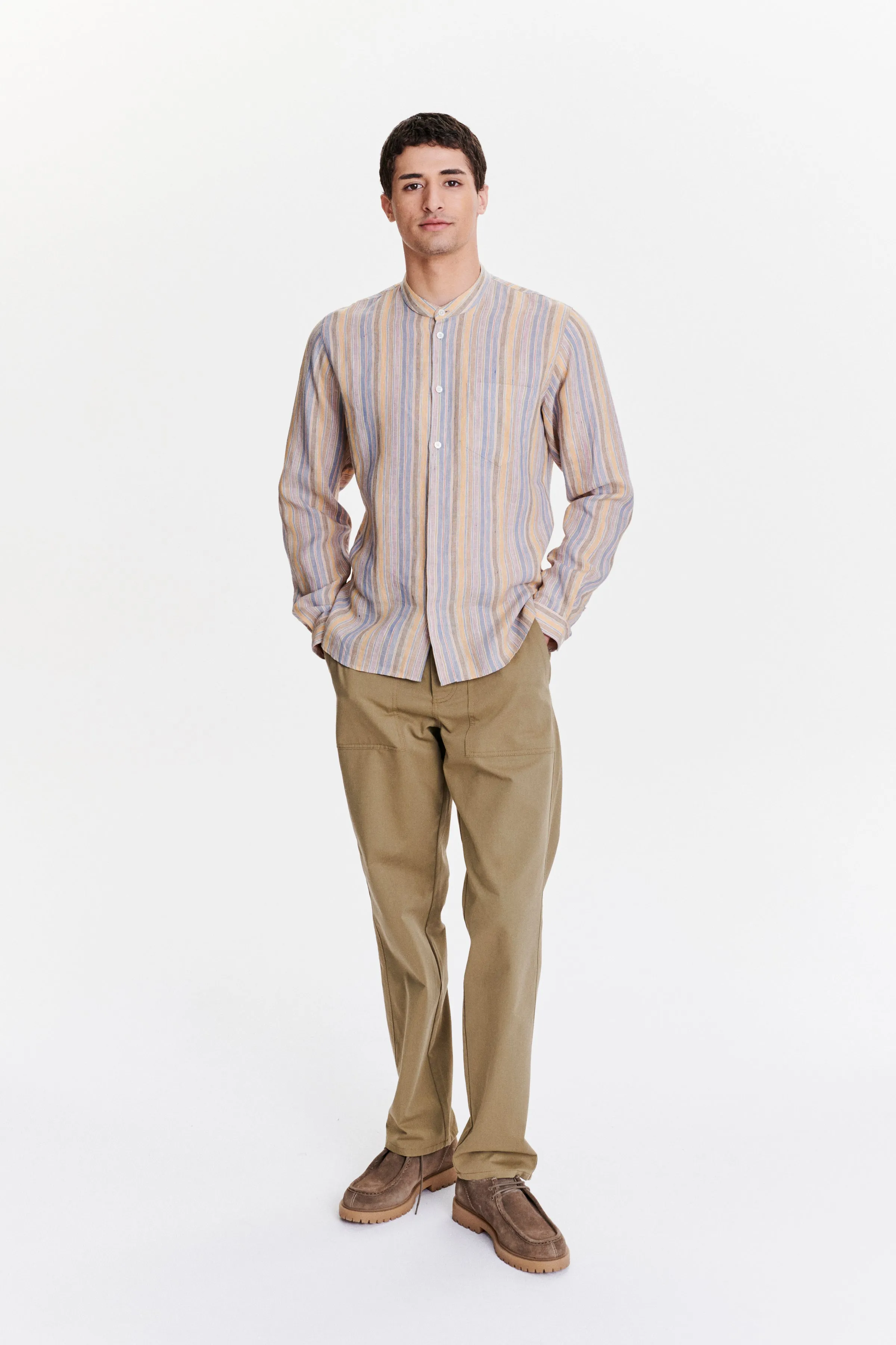 Zen Grandad Collar Shirt in a White, Blue, Yellow, Beige, Pink and Orange Striped Portuguese Linen sold by Delikatessen