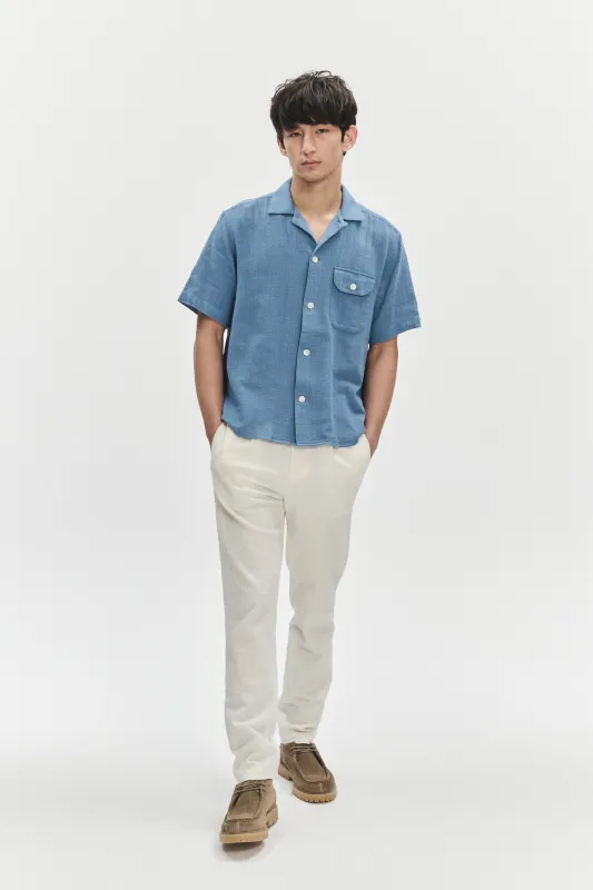 Short Sleeve Camp Collar Shirt  in a Blue Airy Structural Portuguese Cotton sold by Delikatessen