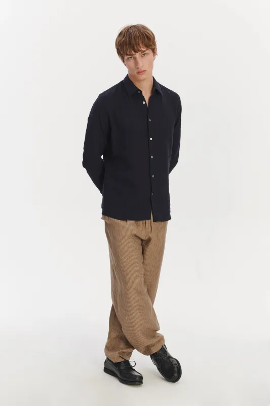 Feel Good Shirt in a Dark Navy Light Structural Portuguese Cotton sold by Delikatessen