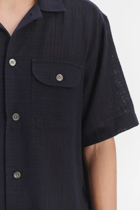 Short Sleeve Camp Collar Shirt  in a Dark Navy Airy Structural Portuguese Cotton sold by Delikatessen
