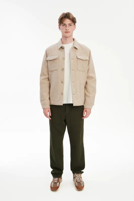 Winter Jacket in a Thick Recycled Italian Wool and Polyamide sold by Delikatessen