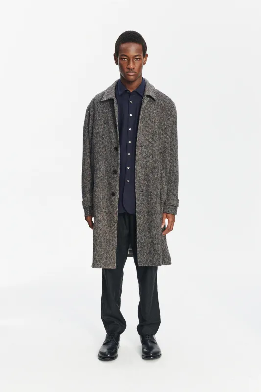 Winter Coat in a Grey and Black Italian Virgin Wool Herringbone Tweed with Meida Thermo Insulation sold by Delikatessen