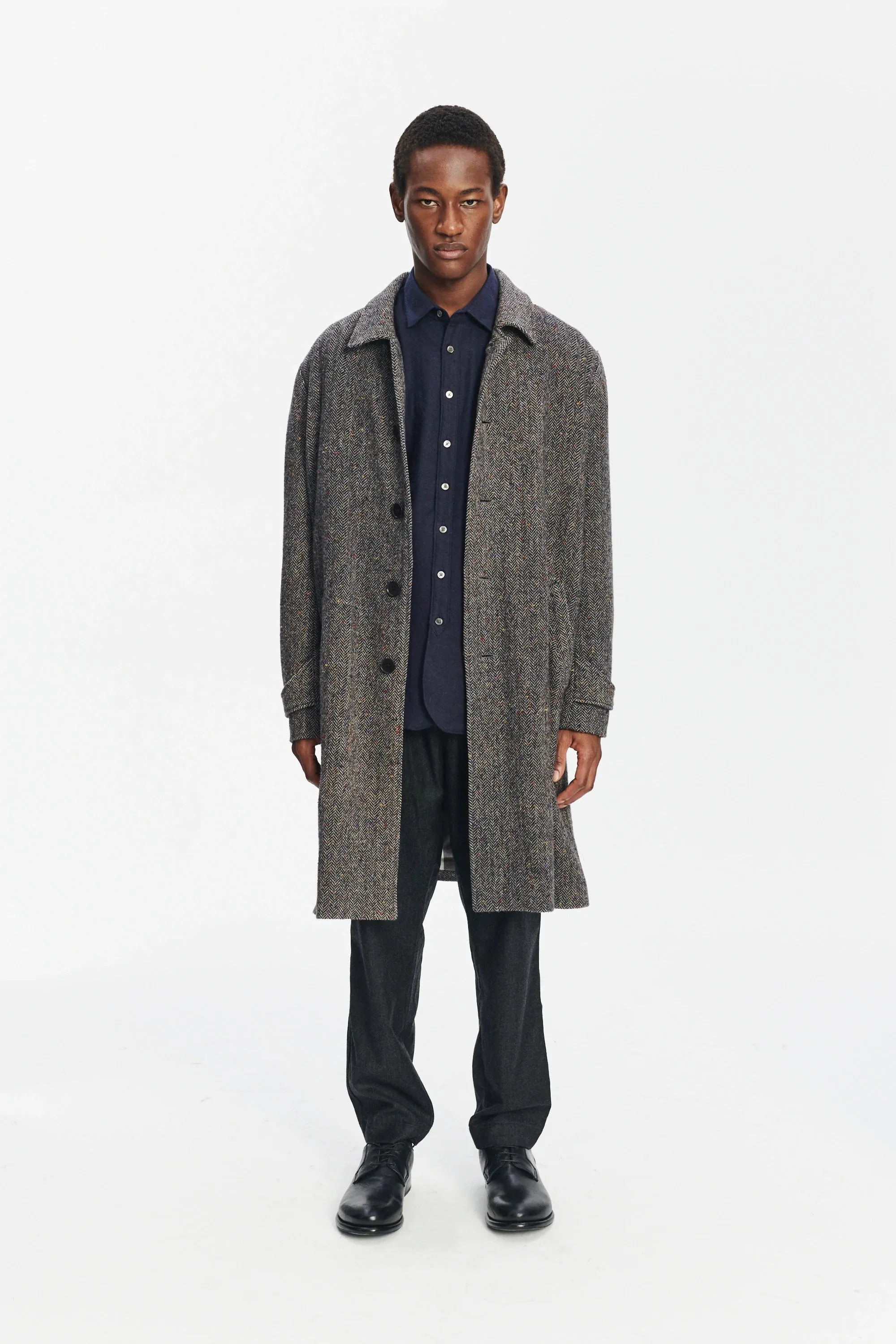 Winter Coat in a Grey and Black Italian Virgin Wool Herringbone Tweed with Meida Thermo Insulation sold by Delikatessen