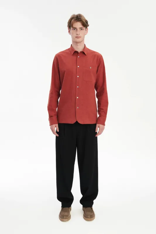 Strong Shirt in a Deep Orange Melange Recycled Italian Cotton Flannel sold by Delikatessen