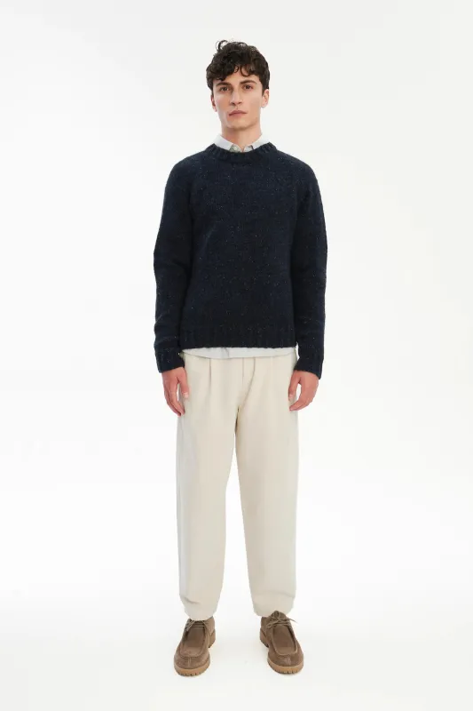 Crewneck Raglan Sweater in a Sustainable Melange Yarn – Navy sold by Delikatessen