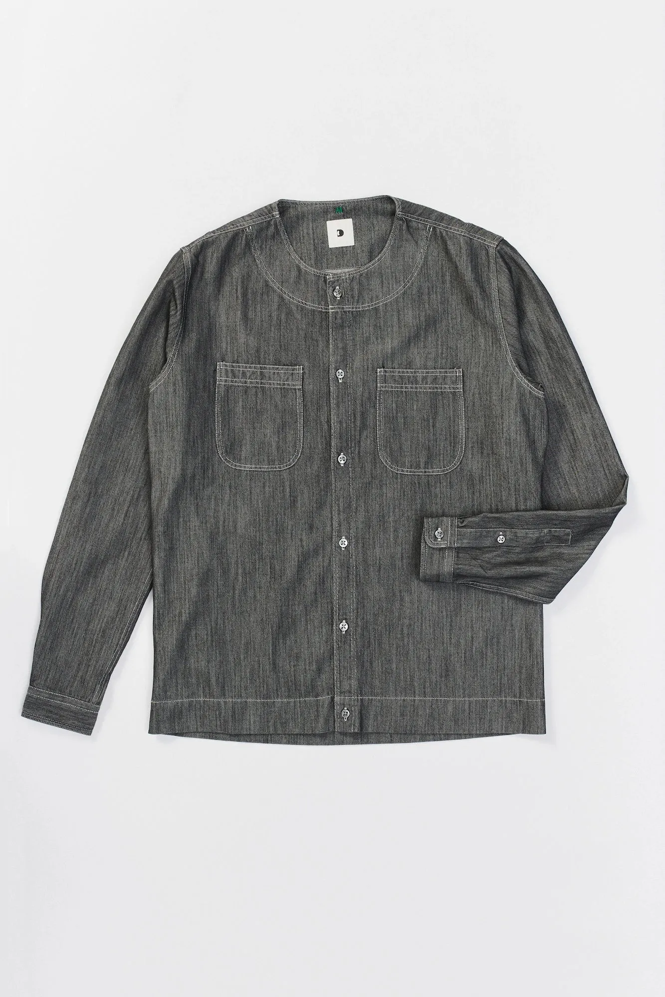 Collarless Carpenter Overshirt in a Washed Grey Indigo Italian Cotton Denim sold by Delikatessen