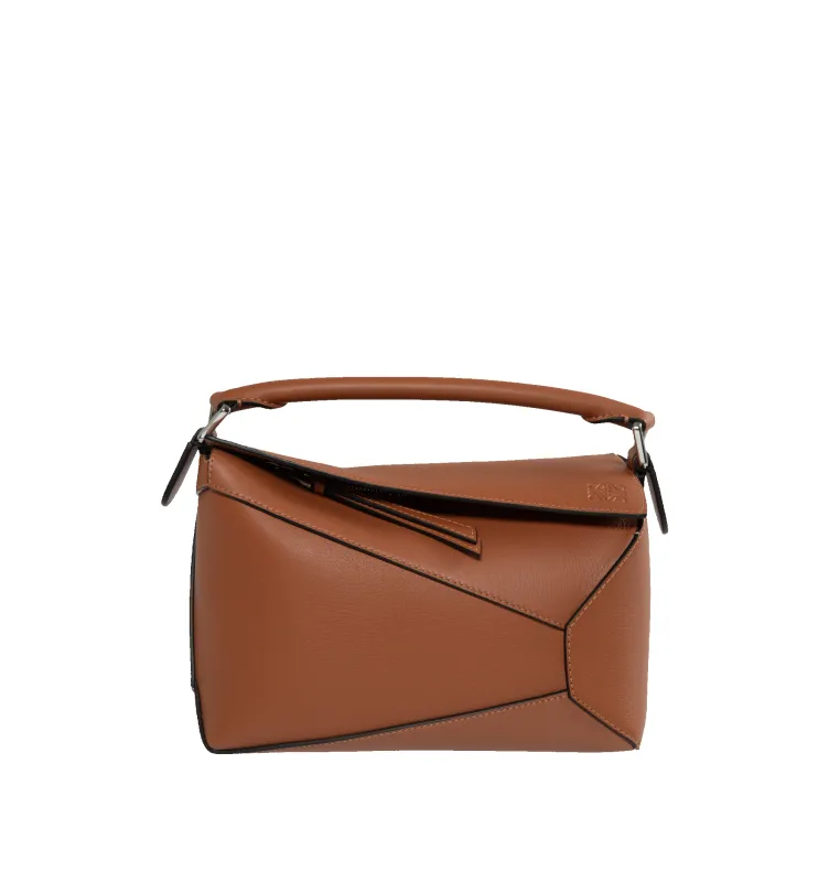 PUZZLE EDGE SMALL BAG sold by Hirshleifers