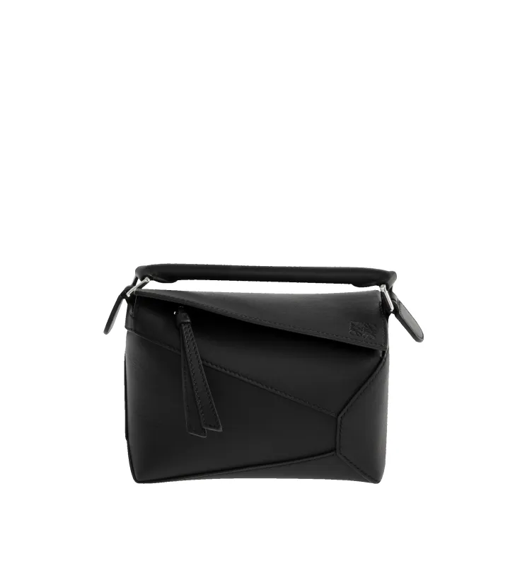 PUZZLE EDGE MINI BAG sold by Hirshleifers