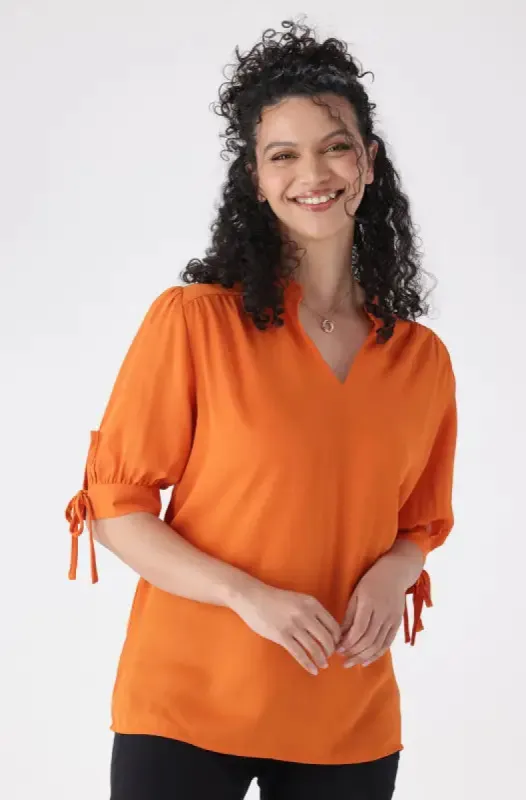 Klhoe Woven Puff Sleeve Top _ 145930 _ Orange sold by Dunns