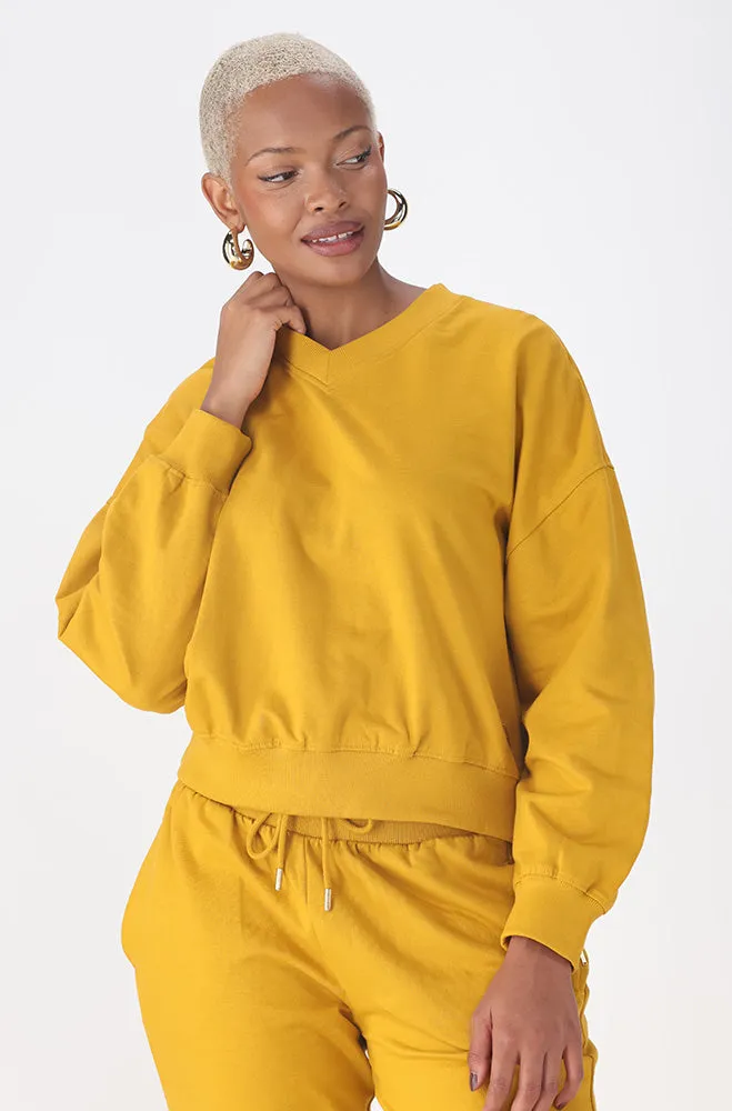 Alexis Fleece V- Neck Neck Top _ 156295 _ Yellow sold by Dunns