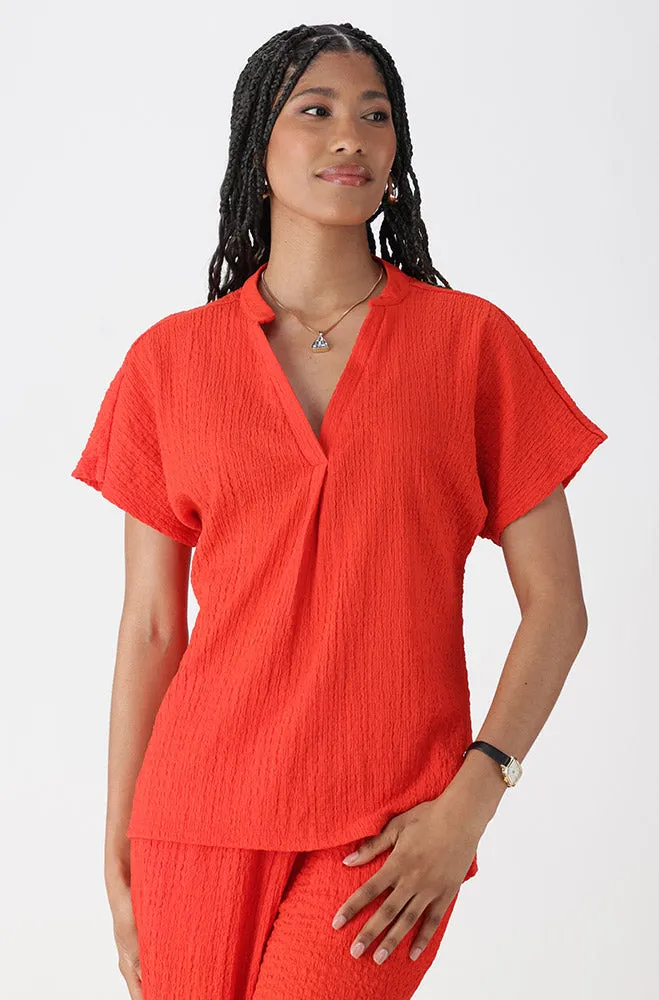 EDITH TEXTURED SHORTSLEEVE PORTOFINO TOP sold by Dunns