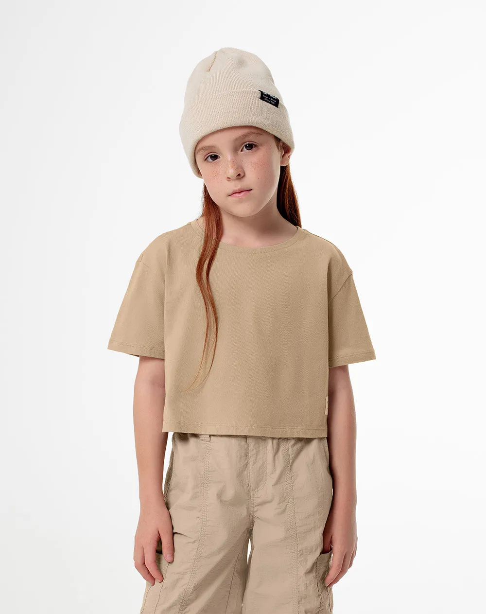 Camiseta crop regular algodón habano niña sold by Gef