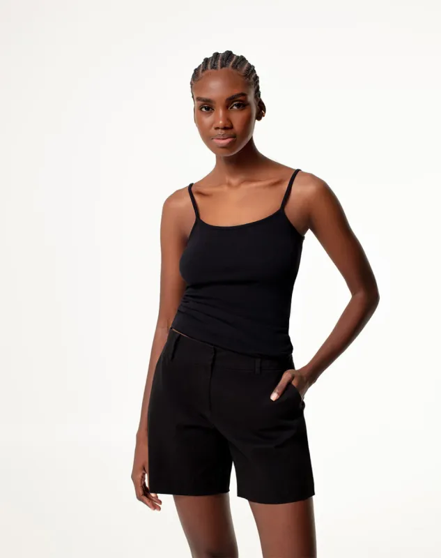 Short tiro medio algodón bolsillos laterales negro para mujer sold by Gef