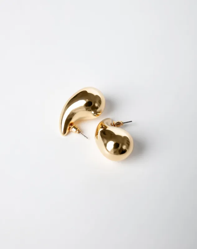 Aretes dorados sold by Gef