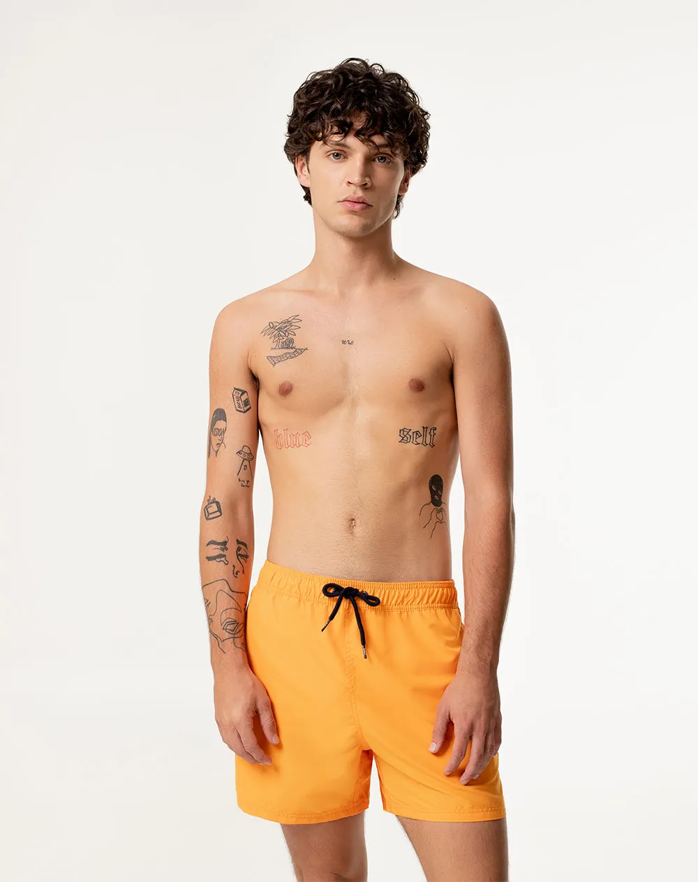 Pantaloneta naranja sold by Gef