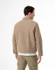 Camisa oversized fit manga larga habana sold by Gef