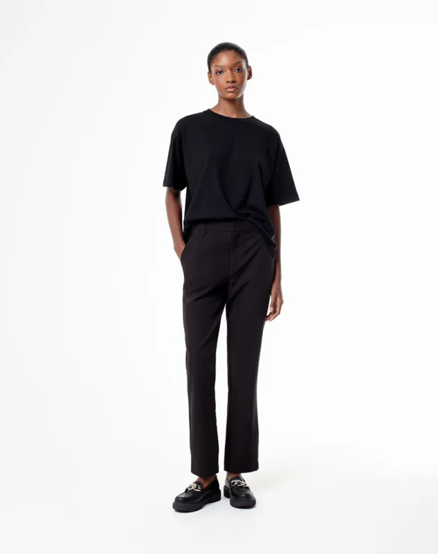 Pantalón tiro medio bolsillos laterales negro para mujer sold by Gef