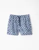 Pantaloneta azul estampado sold by Gef