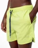 Pantaloneta verde sold by Gef