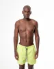 Pantaloneta verde sold by Gef