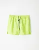 Pantaloneta verde sold by Gef