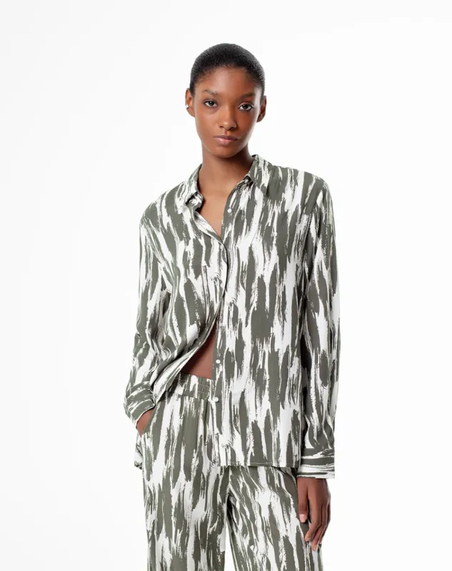 Camisa manga larga holgada estampada mujer sold by Gef