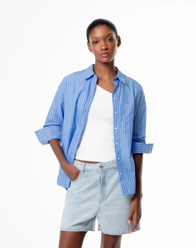 Camisa oversized fit manga larga azul con rayas sold by Gef
