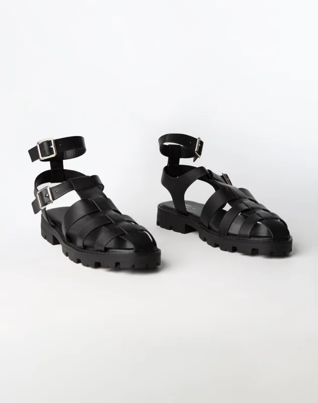 Sandalias negras sold by Gef
