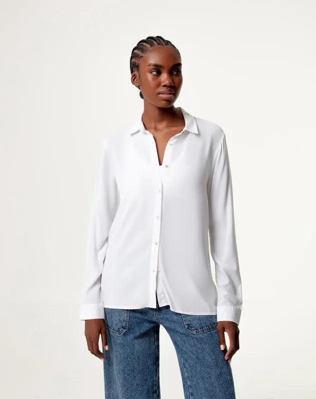 Camisa regular fit manga larga blanca sold by Gef