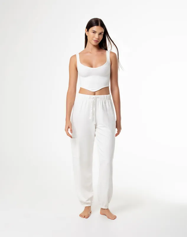 Pantalón relaxed fit tiro medio crudo sold by Gef