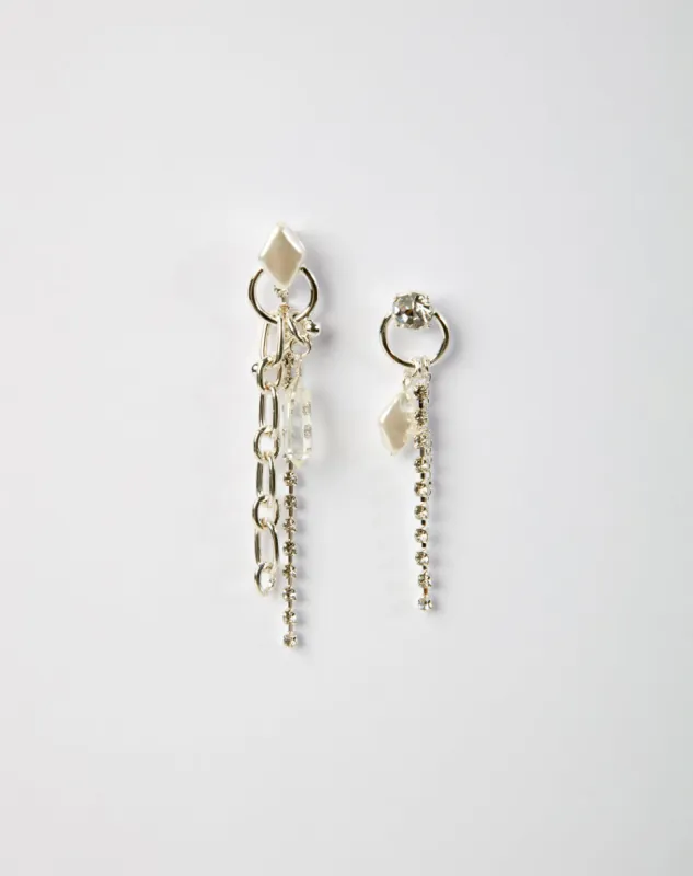 Arete plateado sold by Gef