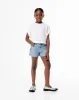 Short tiro medio denim brillo y elástico interno índigo claro niña sold by Gef