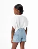 Short tiro medio denim brillo y elástico interno índigo claro niña sold by Gef