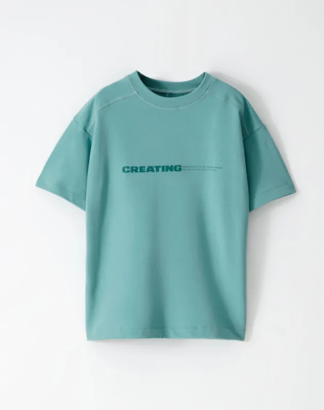Camiseta regular fit manga corta azul sold by Gef