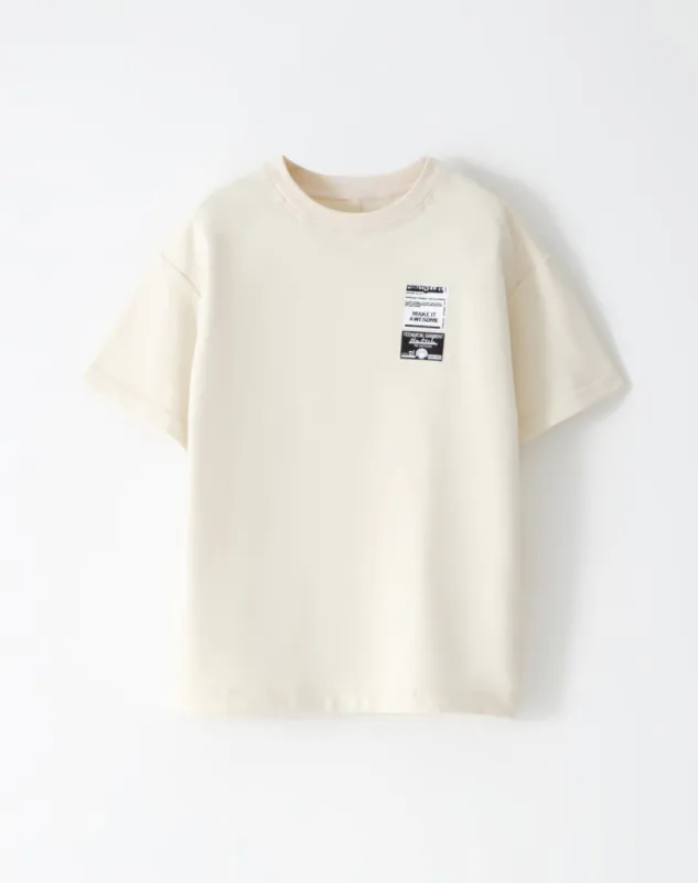 Camiseta regular fit manga corta crema sold by Gef
