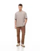 Pantalón regular fit tiro medio en drill cafe sold by Gef