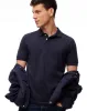 Polo slim fit azul jaspeada sold by Gef