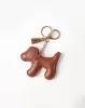Charms de perrito cafe sold by Gef