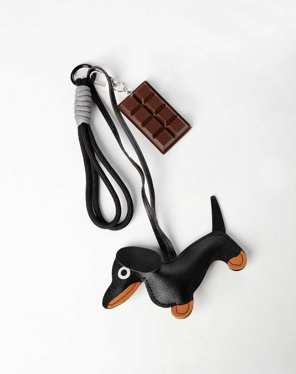 Llavero charm perrito negro sold by Gef