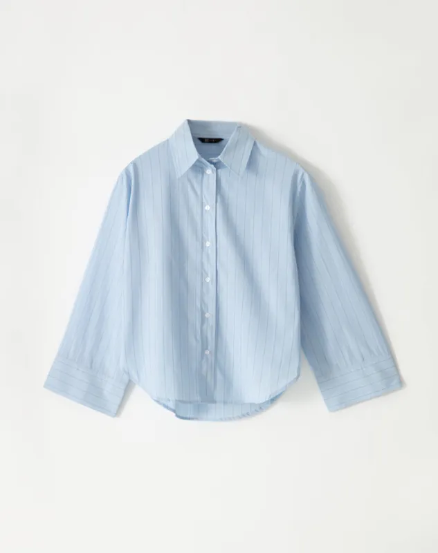 Camisa oversized fit manga larga azul con rayas sold by Gef