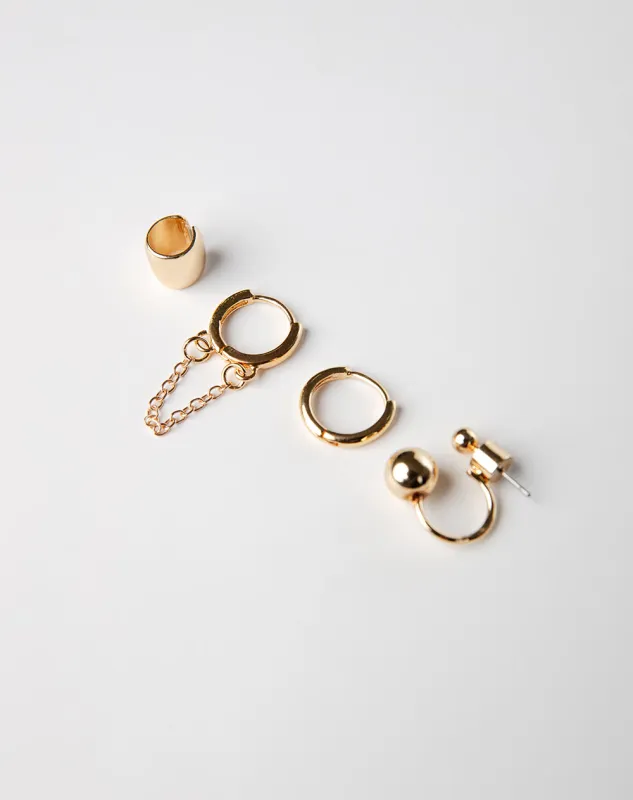 Set aretes + earcuff dorados sold by Gef